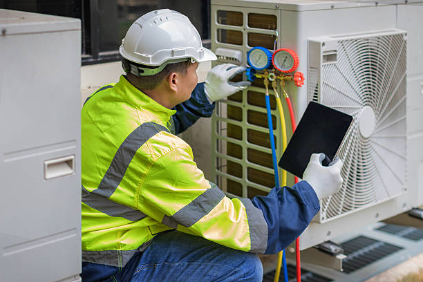 Professional Air Conditioning Repair technician working in Georgetown, NY